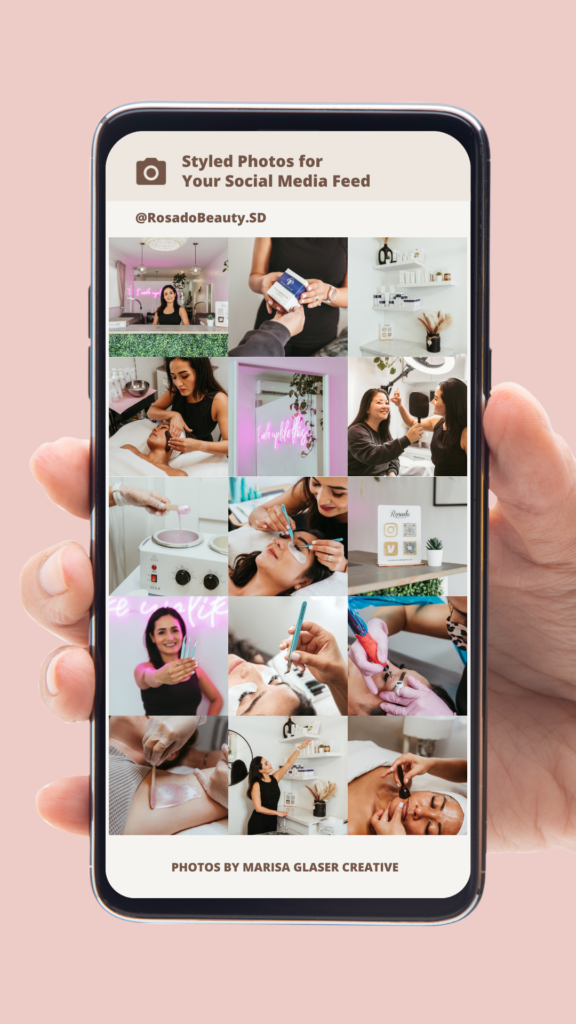 A mockup graphic design image of a hand holding an iPhone on a pink background, showing an Instagram feed. The feed shows a variety of pictures from this esthetician's brand photography session, and the bottom of the screen says "Photos By Marisa Glaser Creative"