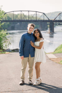 A classic engagement portrait with beautiful natural light and river backdrop.