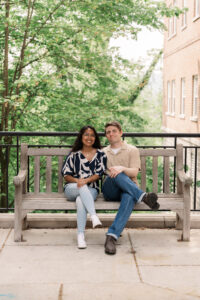 A peaceful, candid moment captured on a park bench during springtime.
